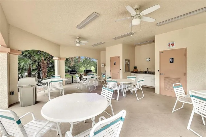 View of patio featuring sink and ceiling fan