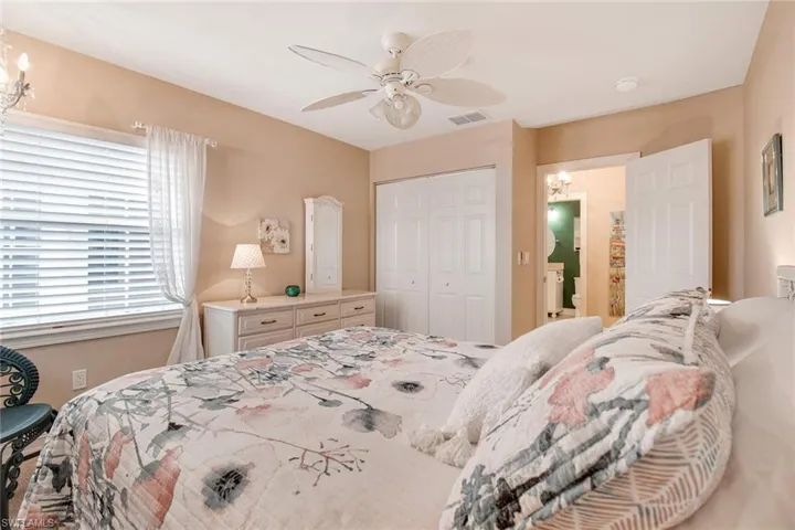 Bedroom with a closet and ceiling fan