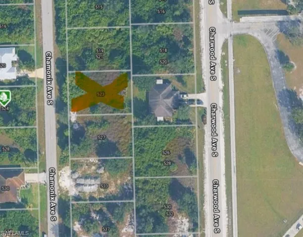 Aerial map of property and surrounding area with property parcel outlined