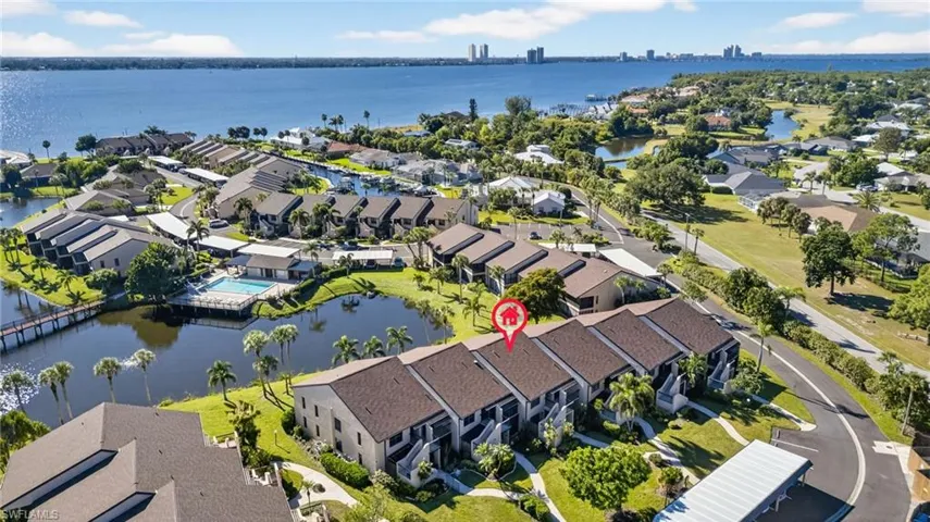 Aerial view of residential area with a large body of water