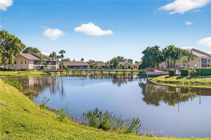 Water view featuring nearby suburban area