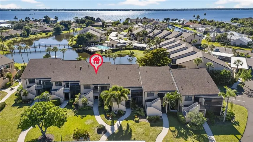Aerial view of residential area with a large body of water