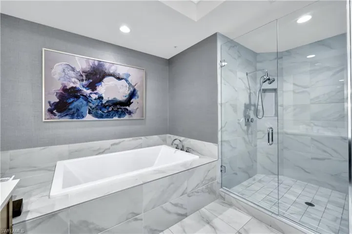The primary bathroom feels like a luxurious spa!