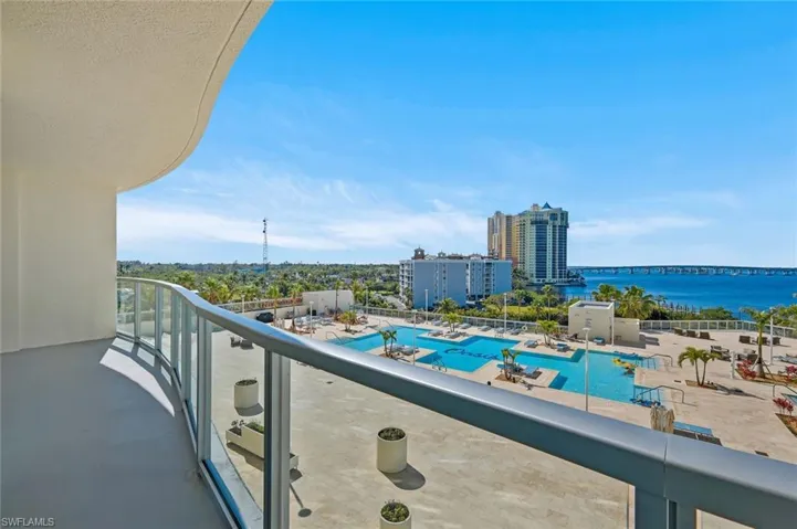 View from the balcony with pool deck + river views