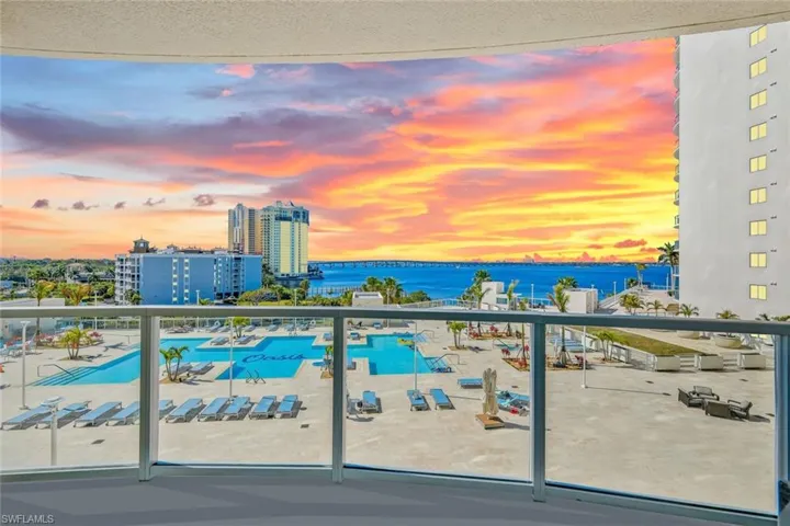 Balcony at dusk with a water view