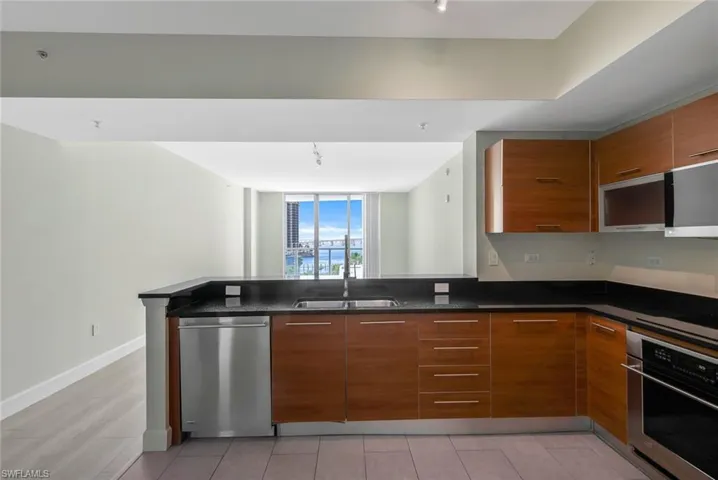 Kitchen with view over the open plan Living area