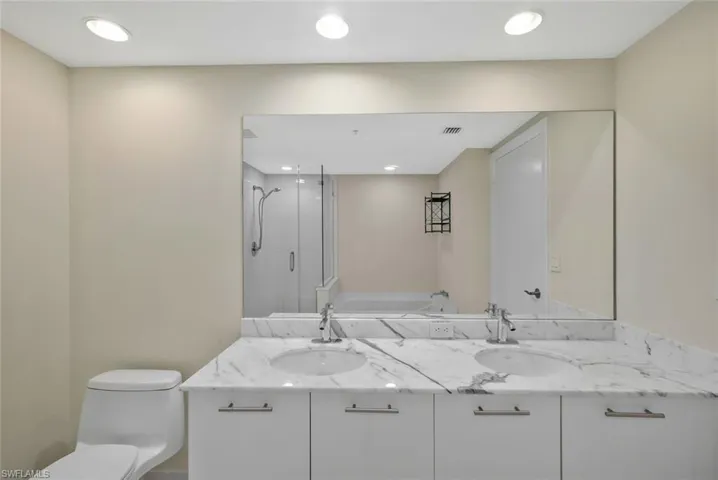 Master Bathroom with walk in shower + separate bath tub