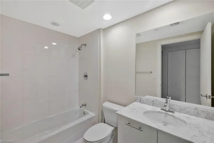 Guest Bathroom with bath tub combo + vanity