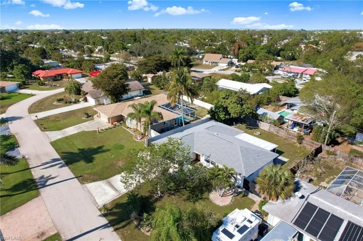 View of property location with nearby suburban area