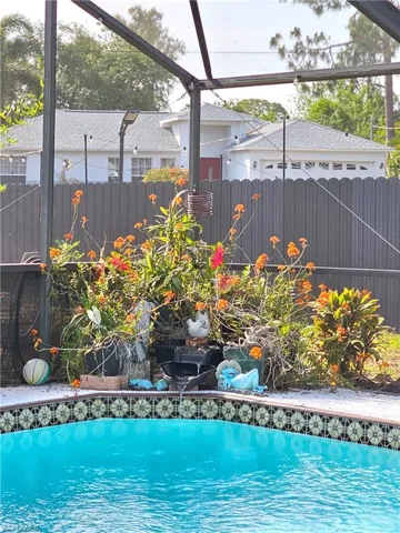 View of pool with fence