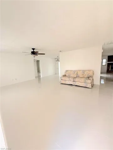 Tiled living area with ceiling fan