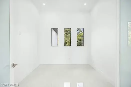 Unfurnished room with recessed lighting