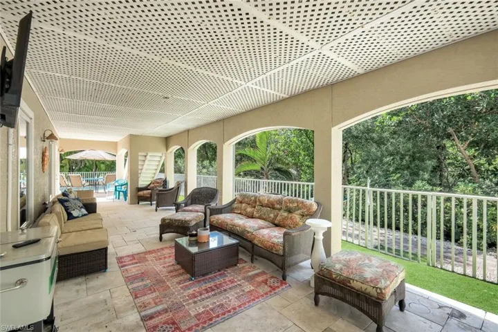 Fenced backyard featuring a patio area and outdoor lounge area
