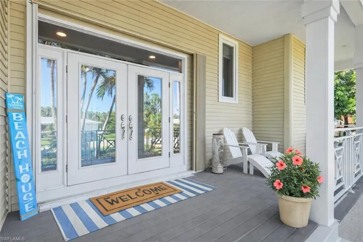 Property entrance featuring french doors