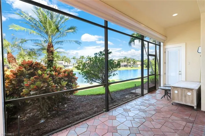 Unfurnished sunroom with a water view