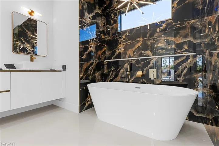 Bathroom with a freestanding bath and vanity