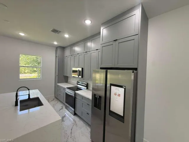 908  Winters E ST, Lehigh Acres, FL 33974