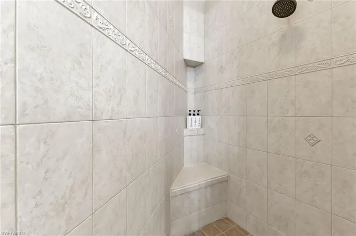 Bathroom featuring tiled shower