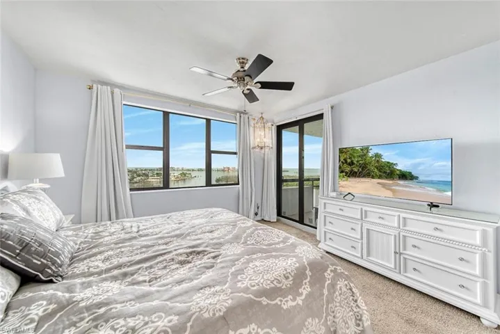 Master bedroom with access to the lanai and vista views from bed.