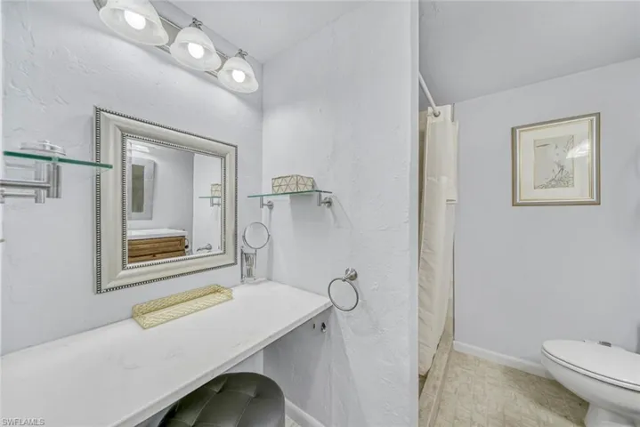Lighted makeup vanity.