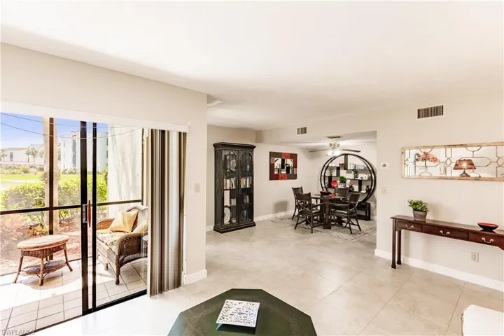 Living area featuring ceiling fan