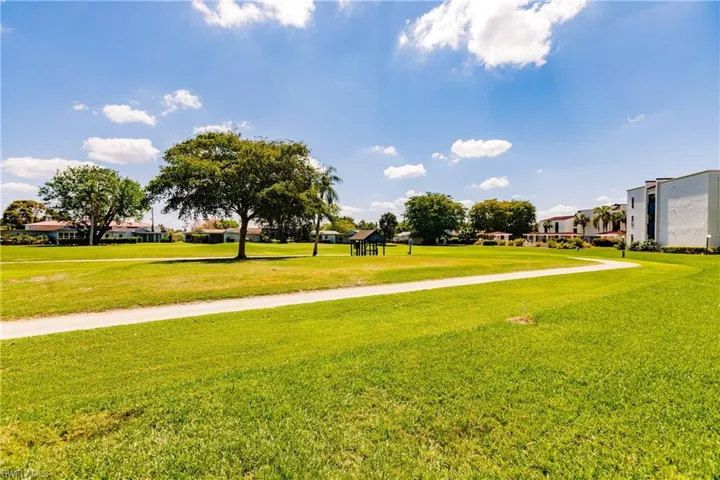 View of community with a yard