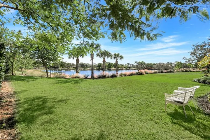 View of grassy yard featuring a water view