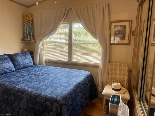 Bedroom featuring ornamental molding