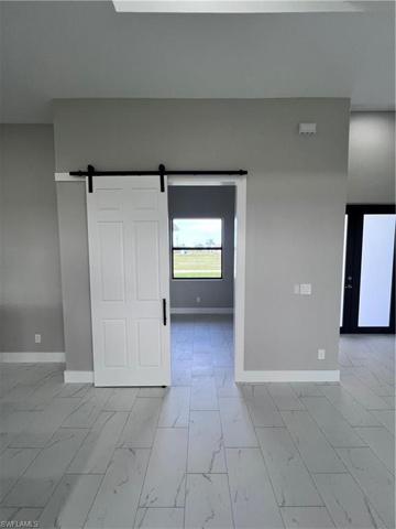 Barn door entry to office/den