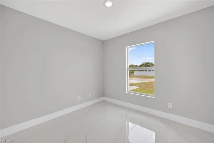 818  Portland E ST, Lehigh Acres, FL 33974