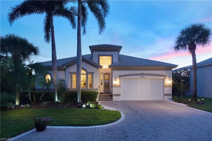 Travel along Bonita Bay Boulevard to Shell Ridge Circle and arrive at the Shell Ridge Court cul de sac; this home is one of the most PRIVATE and special in all of Bonita Bay!