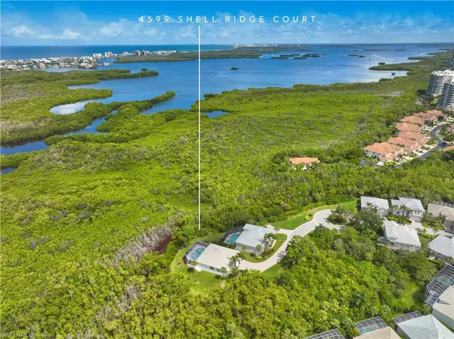 Exclusive location within Bonita Bay. Notice the length of the driveway!