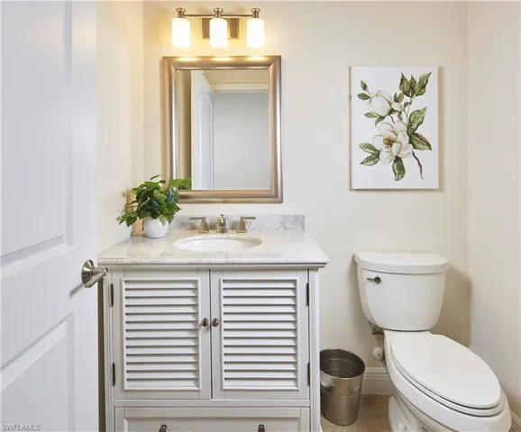 Charming powder room for guests.