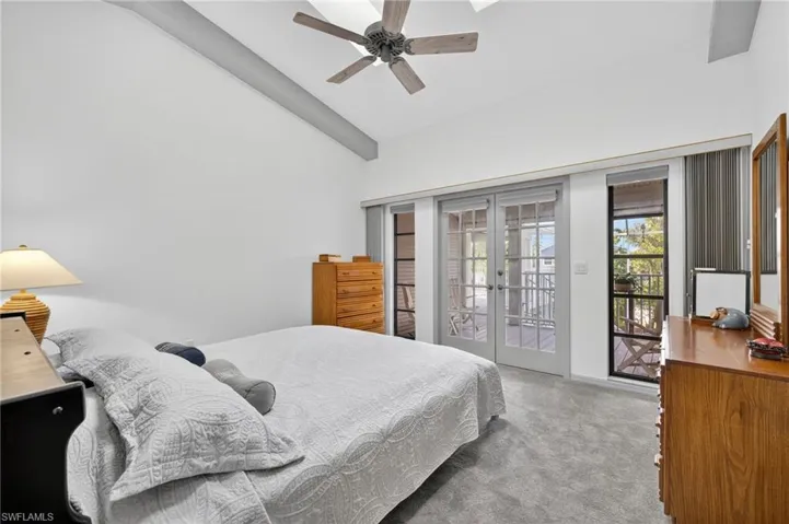 Bedroom featuring french doors