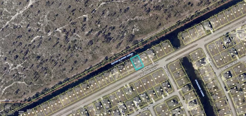 Land across the canal belongs to the State of Fla.