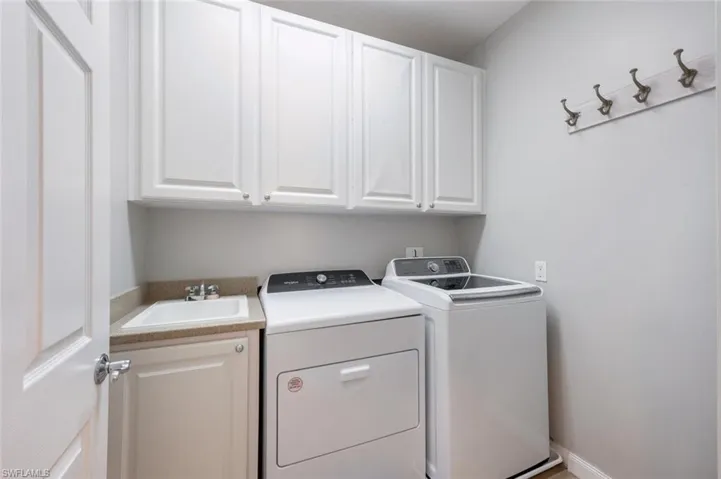 Laundry room with sink.