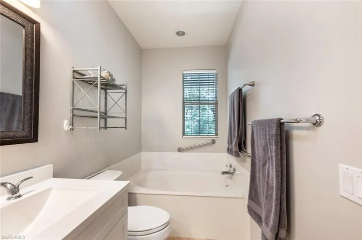 Upstairs Primary bathroom tub.