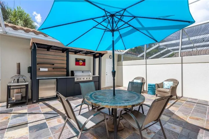 Screened in lanai with access to 2 car garage.