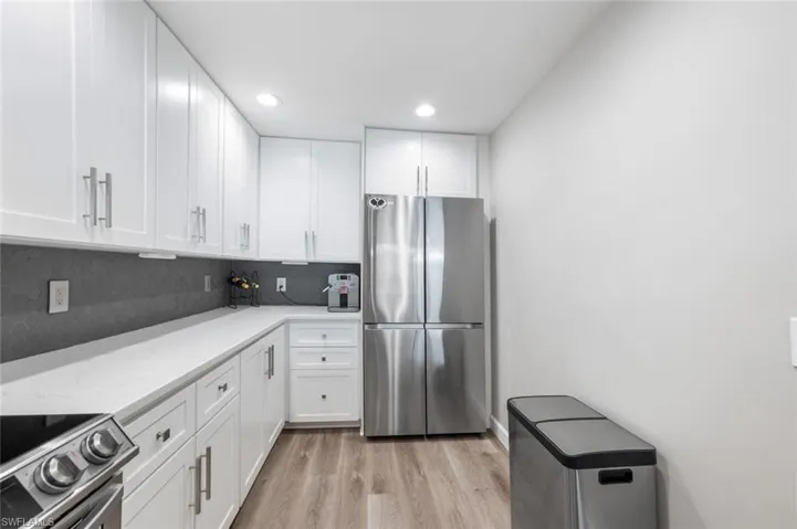 Remodeled kitchen with SS appliances.