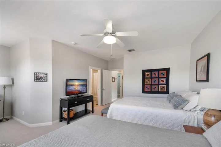 2nd Upstairs Primary bedroom with ensuite bath.