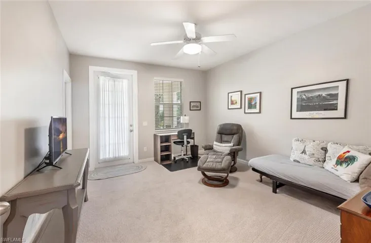 First floor bedroom/den with private access to outdoor porch.