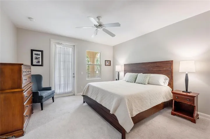 Front Primary bedroom with access to upstairs private balcony.