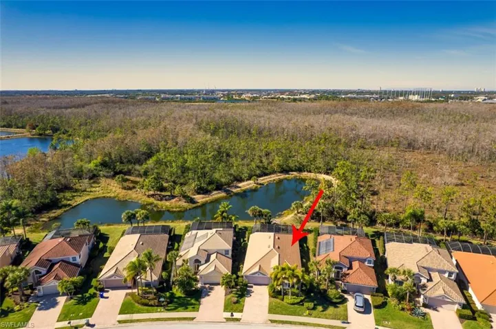 Aerial view of residential area with a large body of water