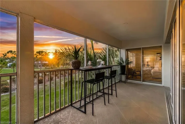 Spacious screened in lanai overlooking the Estero Country Club golf course.