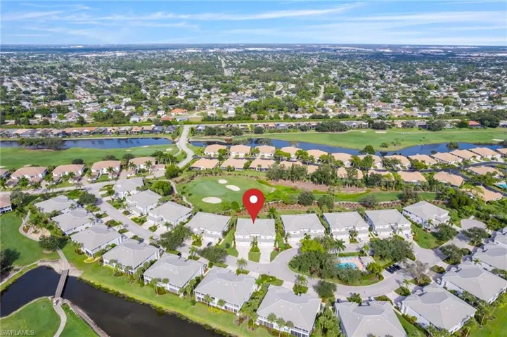 Condo community aerial view of the neighborhood and how it surrounds the greens..