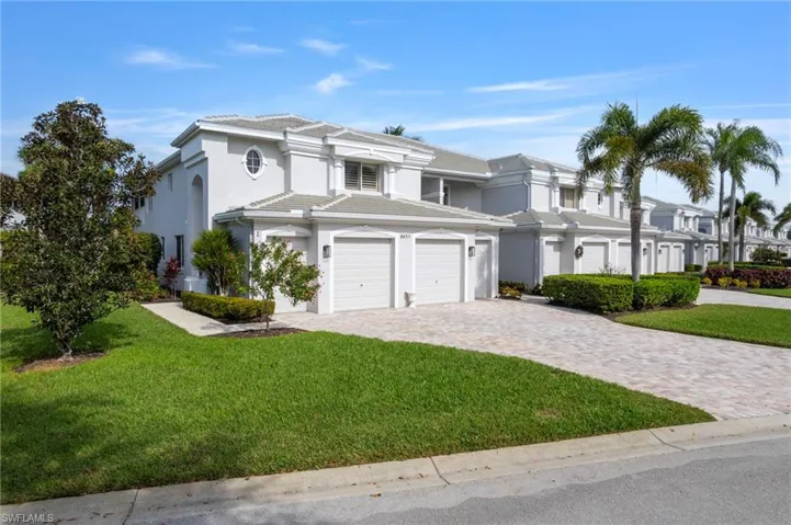 Desirable end, 2nd floor unit with open green space off the private side  door entry.  The Private garage is attached.