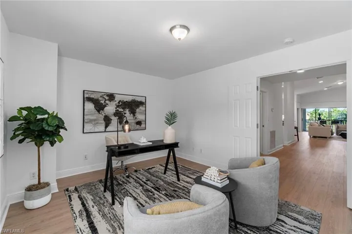 In a private wing off the front elevation - double doors from the 3rd bedroom staged as a spacious office space out to the entry foyer in the main living area.