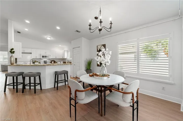 Casual dining is offered through barstool seating at the breakfast bar, while the open floor plan allows space for a more formal dining space as well