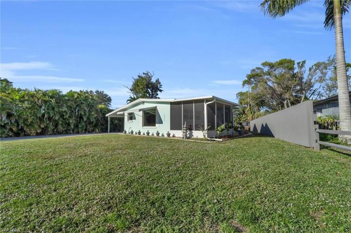 Front Yard and Screened in Lanai