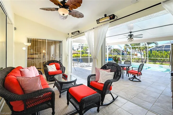 The shaded seating area overlooks the pool deck